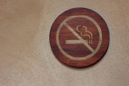 wooden No smoking signage on the wallの写真素材