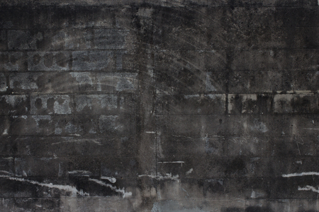 Old brick wall background. Grunge texture. Black wallpaper. Dark surfaceの写真素材