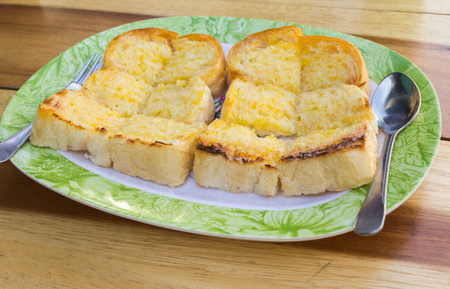 fresh toast in a plate on the tableの写真素材