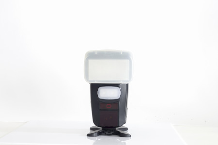Photo camera flash isolated on white backgroundの写真素材