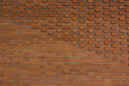 Background of old vintage abstract brick wallの写真素材
