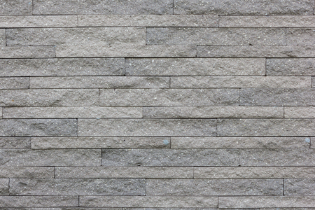 pattern of decorative white slate stone wall surfaceの写真素材