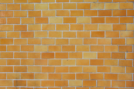 Background of old vintage abstract brick wallの写真素材