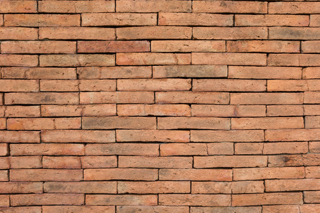 Background of old vintage abstract brick wallの写真素材