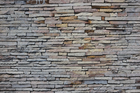 pattern of decorative white slate stone wall surfaceの写真素材