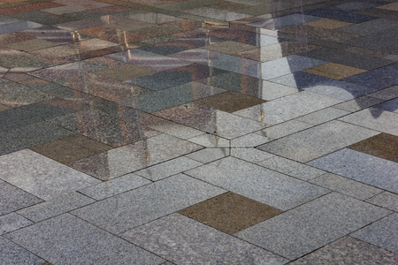 Thai temple reflection in Granite flooring surfaceの写真素材