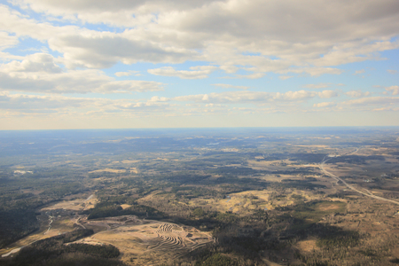 View from a landing airplane out the window of cityの写真素材