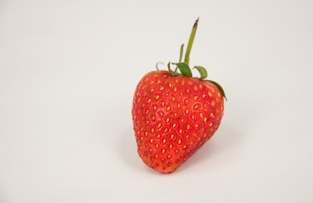 a strawberry isolated on white backgroundの写真素材