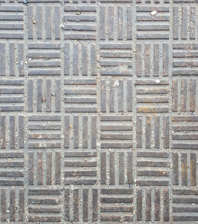 Closeup photo of Sewer manhole on the road.の写真素材