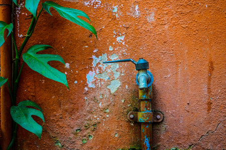 Man hand closed Faucet