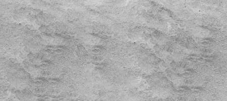 The gray and white cement floor used as a walkway or may be a cement floor on the walls in the construction can be used as a background image, suitable for architecture, design or house-related work.の写真素材