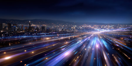 Digital information trails with glowing light streaks speeding toward city skyline night, creating futuristic and dynamicの素材