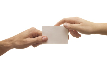 hand of a man who give a business card to a womanの写真素材