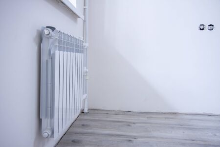 Repair of the heating system in the room concept.の写真素材