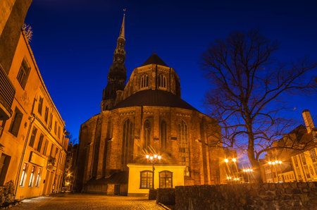 St Peter s Church in Riga  Latvia  at nightの写真素材