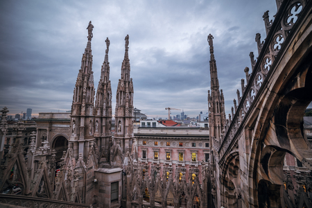 Milan, Italy: gothic roof of Cathedral in sunsetの写真素材