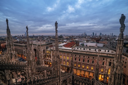 Milan, Italy: gothic roof of Cathedral in sunsetの写真素材