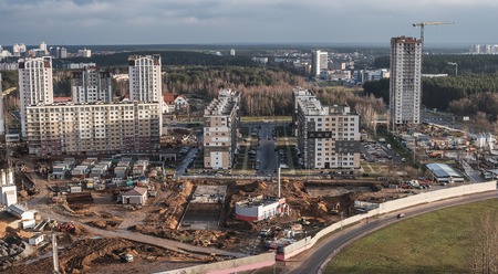Minsk, Belarus: construction of multi-stored houses in new part of city in the autumnの写真素材