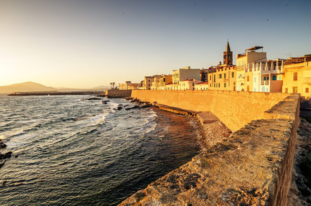 Alghero, Sardinia: defensive walls in the beautiful sunsetの写真素材