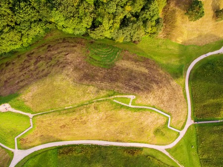 Flat lay, aerial top view of Kernave, historical capital city of Lithuania, in the sunsetの写真素材