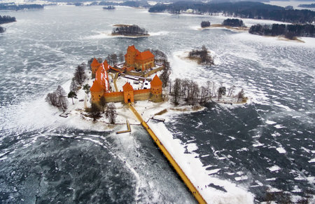 Trakai, Lithuania: aerial winter UAV top view, flat lay of gothic Island Castle