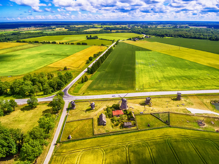 Saarema Island, Estonia: beautiful aerial top view of summer fields and Angla windmills in Leisi Parishの写真素材