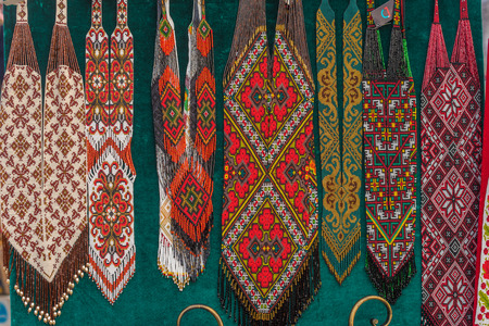 Traditional colourful Ukrainian patterns in the handicraft martの写真素材