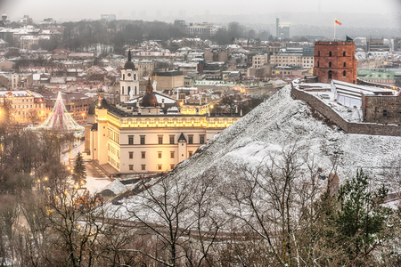 Vilnius, Lithuania: aerial view of the old town,  christmas tree and decorations in Cathedral Square at sunsetの写真素材