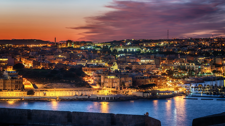 Malta: Il-Gzira and Marsans Harbour. Aerial view from city walls of Valletta at sunsetの写真素材