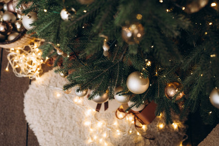 Basket of Christmas Ornaments with Glowing Fairy Lightsの写真素材