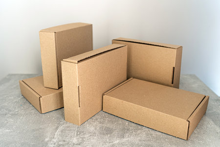 Kraft cardboard boxes arranged for packaging, storage, and gift wrappingの写真素材
