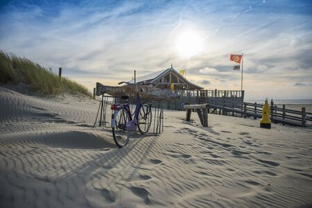 HOLLAND, ZEELAND, 05 AUGUST 2018, Ð¡oast of the north sea, coastal cafe and parked bicycle, Zeeland, Hollandのeditorial素材