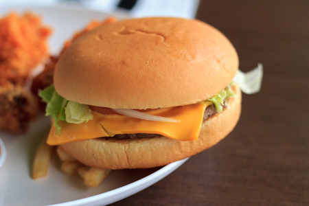 Close-up burger, burger select focus on a white plate, burger breakfastの写真素材