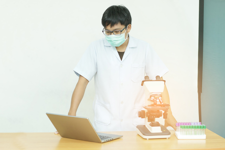 Equipment for research experiments in science laboratory, Microscopy and empty vacuum blood tube,microscope in medical laboratory,Scientists are experimenting in labsの写真素材