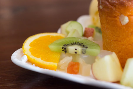 Sliced fruit on wood table,Closeup mix fruit の写真素材