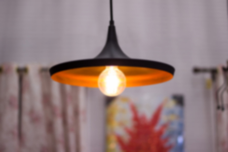Blur ceiling light,hanging round light bulb blurry,light bulb interior blurry の写真素材