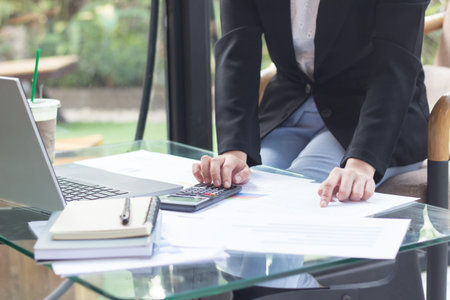 Young woman sit working in a coffee shop,Employees are working outside the company,Students are...