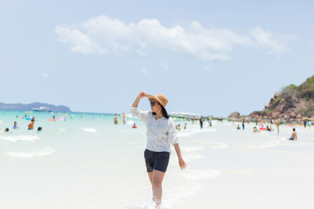 Young women traveling relax on the beach on summer, Concept beach on summerの写真素材
