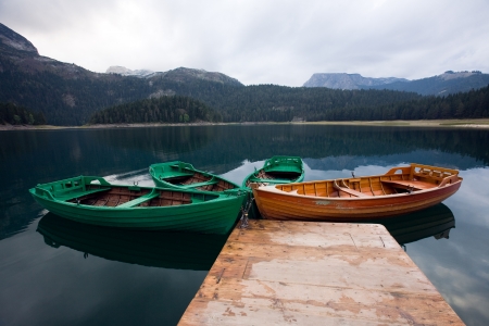 lake and mountains the boatsの写真素材