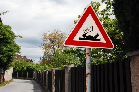 creative readjust of street sign caution of retarderの写真素材