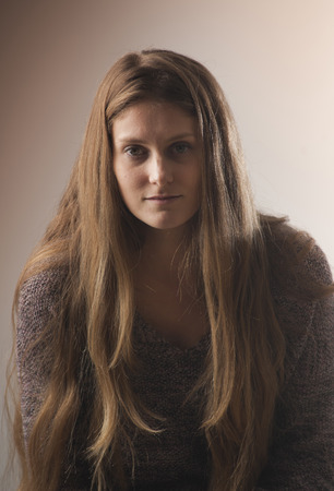 Portrait of young wooman with long hair. Vintage style.の写真素材