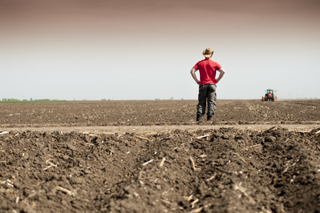 Work on field during soy planting timeの写真素材