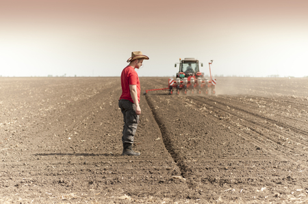 Work on field during soy planting timeの写真素材