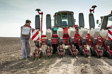 Work on field during soy planting timeの写真素材