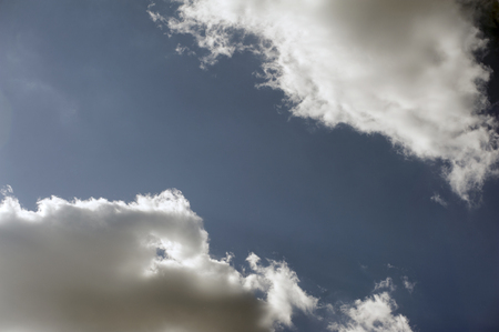 Background of blue sky and white cloudsの写真素材