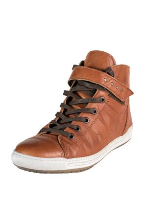 Brown leather top Snickers with laces and straps for long, daily street walks. Demi-season, semi-sports, comfortable and fashionable women's shoes. Isolated on white background. Lifestyle.の写真素材