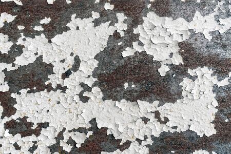 Abstract grunge rusty steel background, retro vintage metal surface with cracked white paint. Old metal texture close up for your design.の写真素材