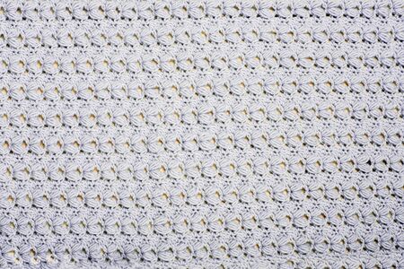 Close-up knitted fabric texture for wallpaper, design and abstract background. Crochet.の写真素材