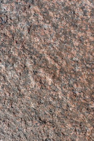 Natural untreated granite stone surface for background.の写真素材