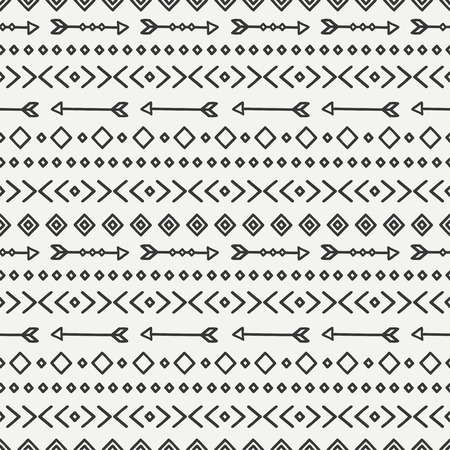 Hand drawn geometric ethnic seamless pattern. Wrapping paper. Scrapbook paper. Doodles style. Tiling. Tribal native vector illustration. Aztec background. Stylish ink graphic texture.のイラスト素材
